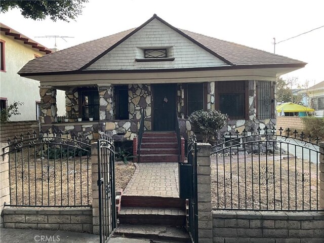 bungalow-style home featuring a porch