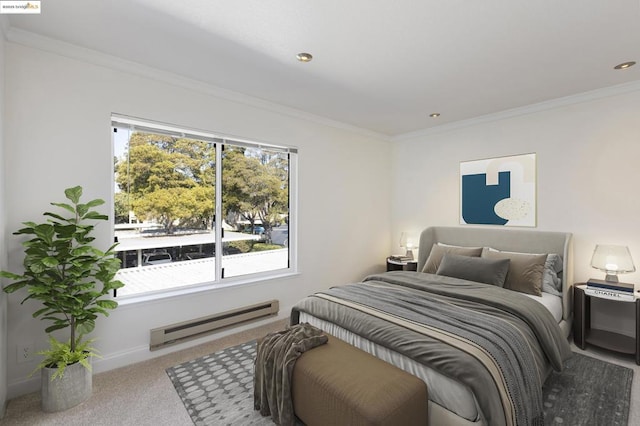 bedroom featuring baseboard heating, ornamental molding, multiple windows, and carpet flooring