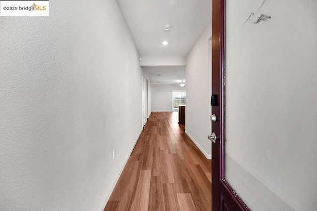 hallway featuring light wood-type flooring