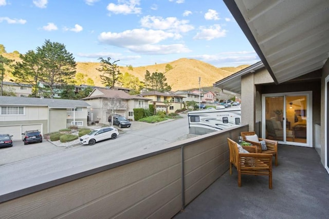 balcony featuring a mountain view