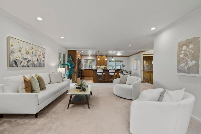 living room with light carpet and ornamental molding