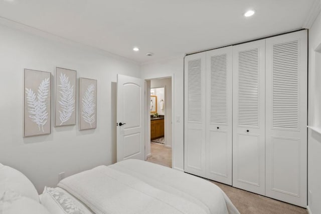 carpeted bedroom featuring a closet