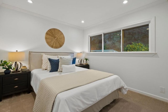 carpeted bedroom featuring crown molding