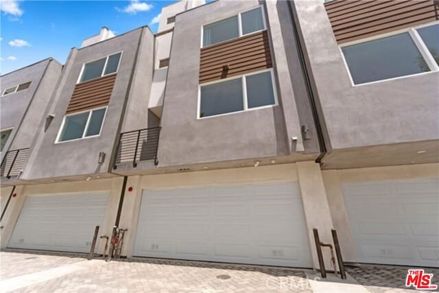 exterior space with a garage