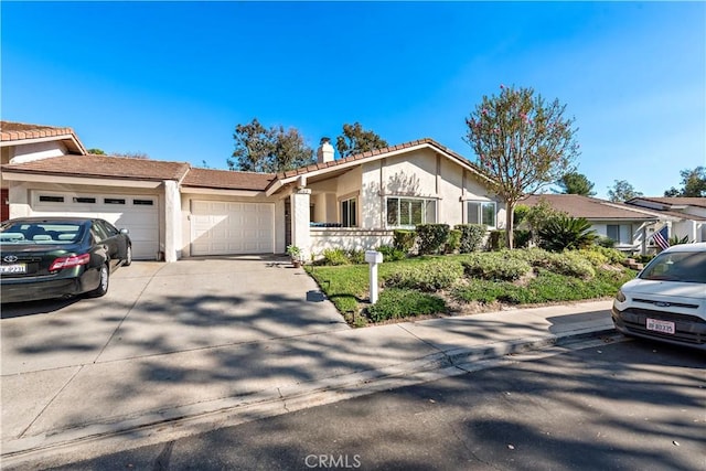 single story home with a garage