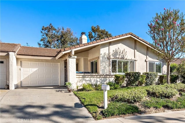 ranch-style home with a garage