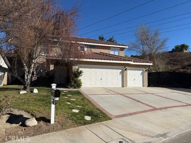 front of property featuring a garage