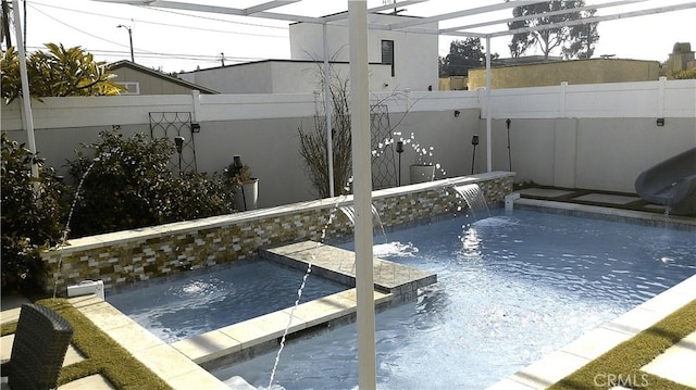 view of pool featuring pool water feature