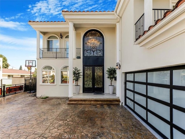 entrance to property featuring french doors