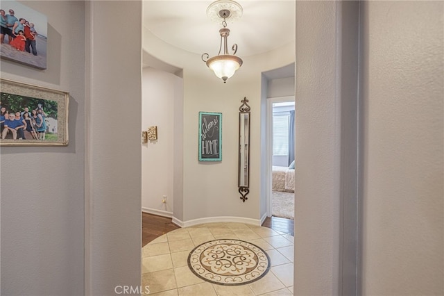 corridor with tile patterned floors