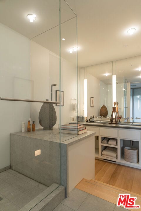 bathroom featuring hardwood / wood-style floors and vanity