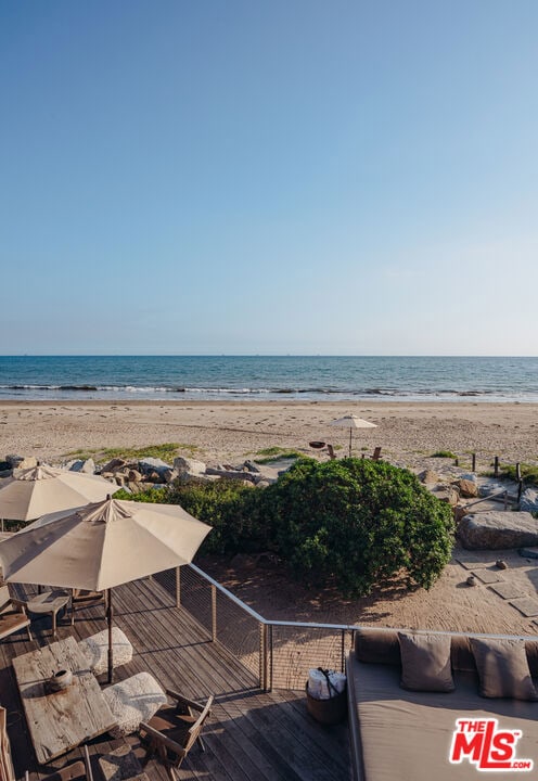 view of water feature with a beach view