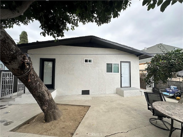 rear view of house with a patio area