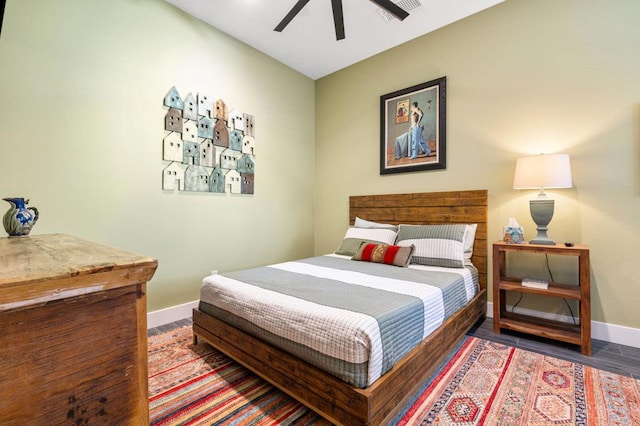 bedroom featuring ceiling fan and wood-type flooring