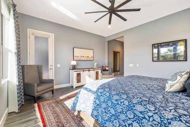 bedroom with ceiling fan and wood-type flooring