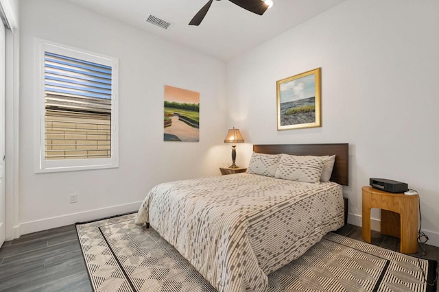 bedroom with ceiling fan and hardwood / wood-style flooring