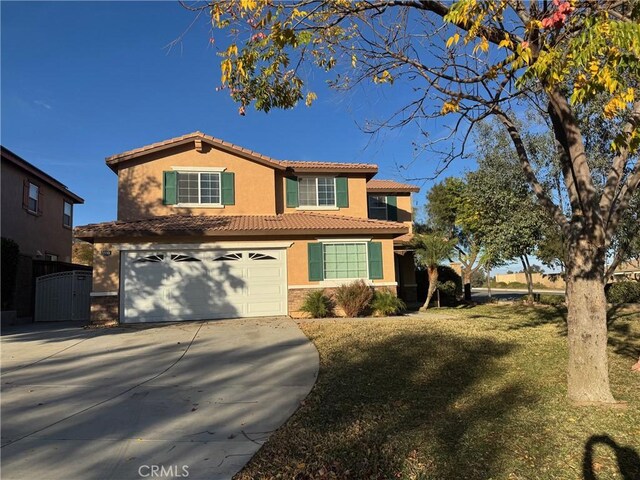 view of front of property with a front yard, central AC, and a garage