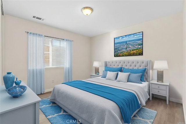 bedroom featuring light wood-type flooring