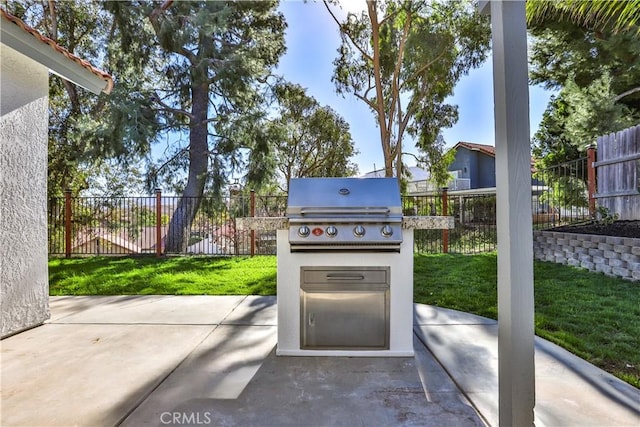 view of patio featuring a grill