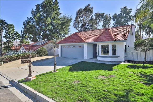 view of front facade with a front lawn and a garage