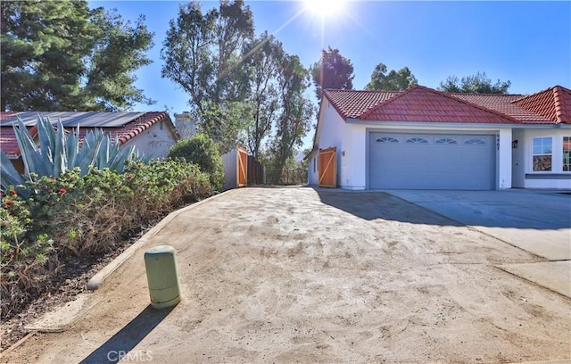 view of home's exterior with a garage