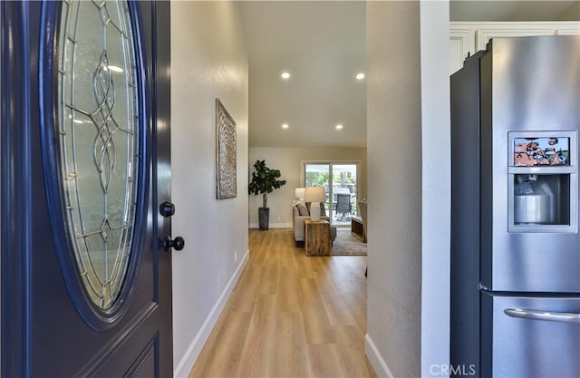 entrance foyer with light wood-type flooring