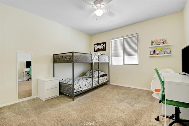 bedroom with ceiling fan and light colored carpet