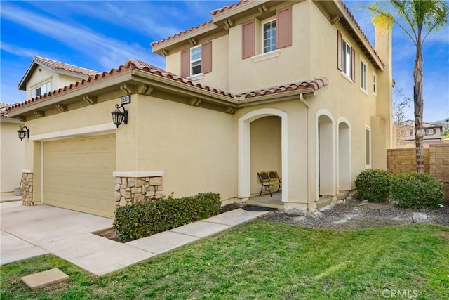 mediterranean / spanish-style house featuring a front lawn