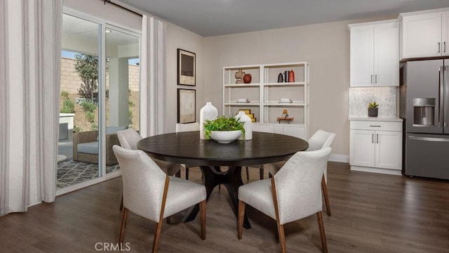 dining room featuring dark wood-type flooring