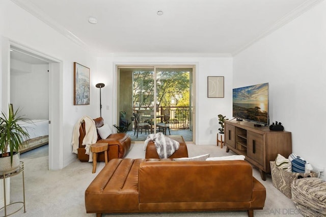 carpeted living room featuring ornamental molding