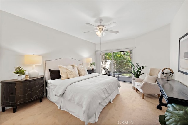 bedroom with light carpet, ceiling fan, and access to outside