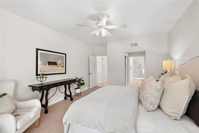 bedroom with ceiling fan and light colored carpet