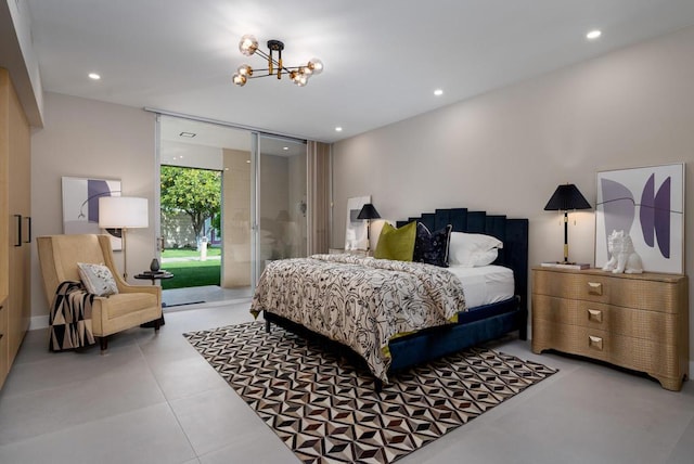 bedroom with access to exterior, expansive windows, and a notable chandelier