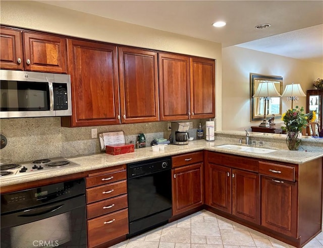 kitchen featuring light tile patterned floors, kitchen peninsula, tasteful backsplash, black appliances, and sink