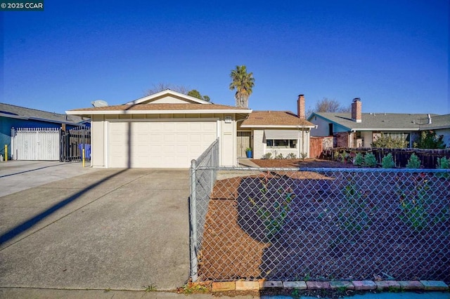 single story home featuring a garage