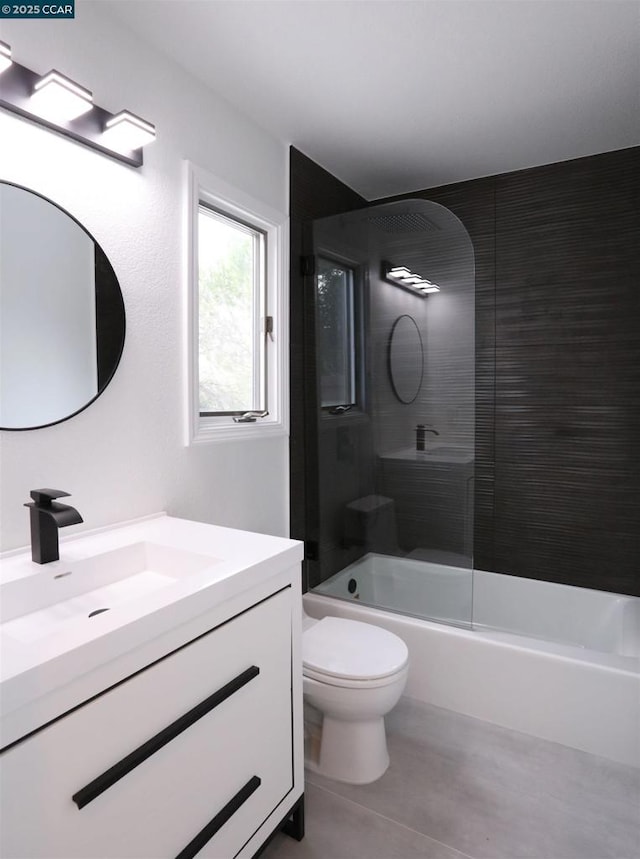 full bathroom with toilet, vanity, and combined bath / shower with glass door