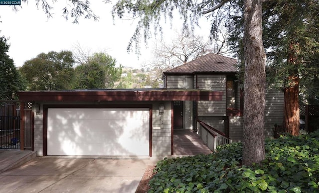 exterior space with a garage