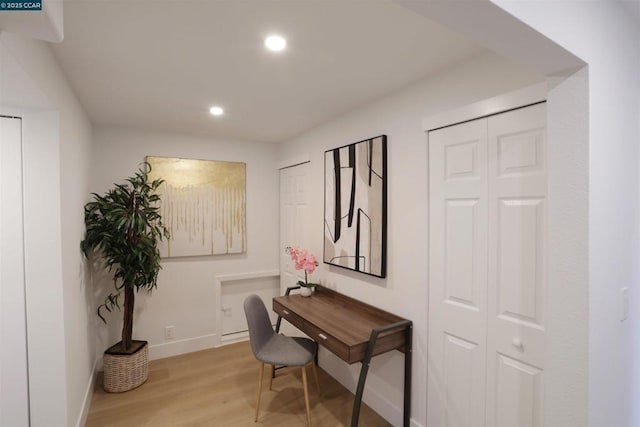 home office featuring light hardwood / wood-style floors