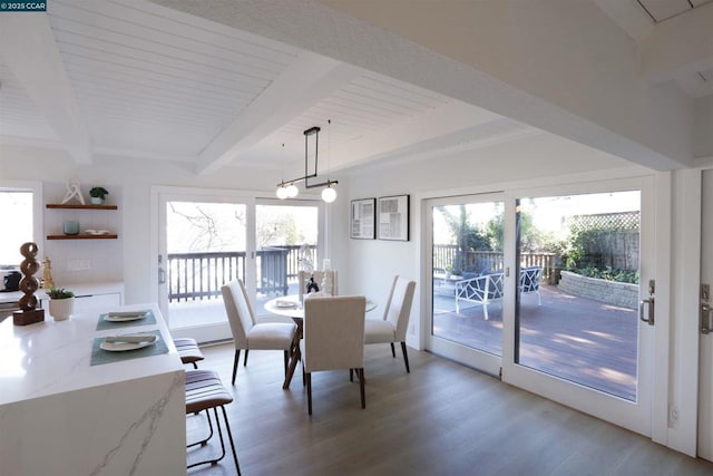 dining space with wood ceiling, a chandelier, hardwood / wood-style flooring, and beamed ceiling