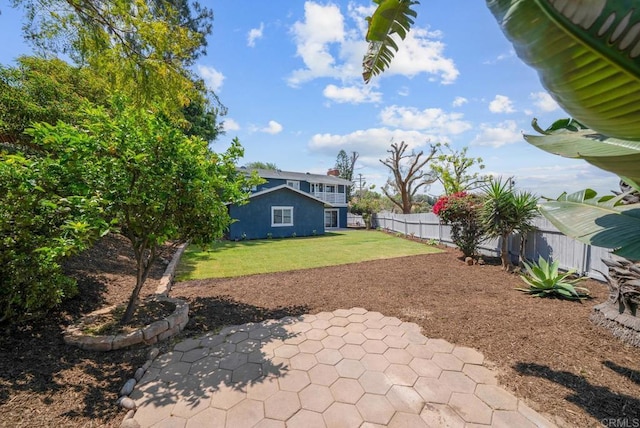 view of yard with a patio area