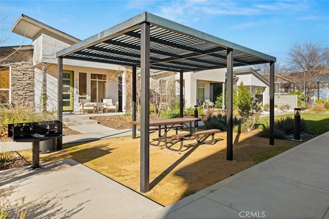 view of home's community with a pergola