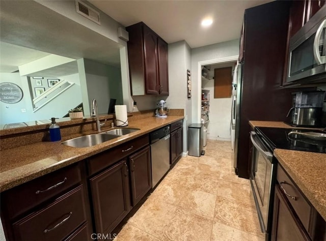 kitchen featuring sink and appliances with stainless steel finishes