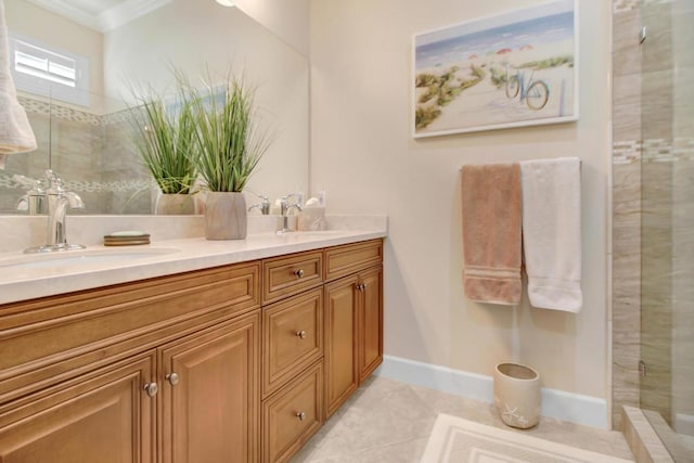 bathroom with vanity, tile patterned floors, crown molding, and walk in shower