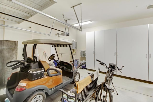 garage featuring a garage door opener