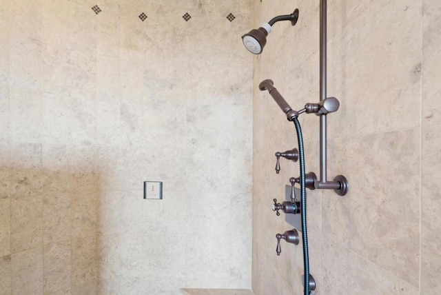 details featuring a tile shower