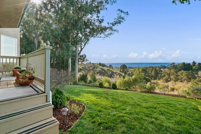 view of yard with a water view