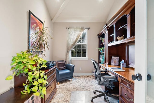 office space with vaulted ceiling