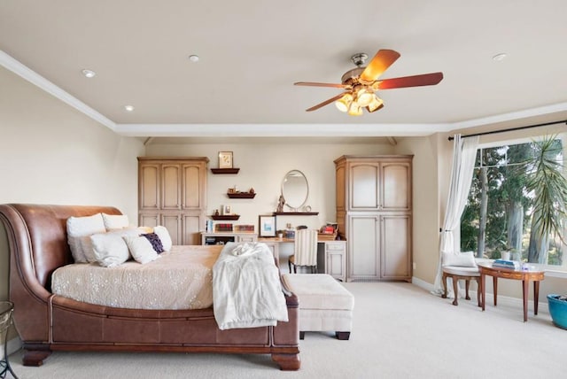 bedroom featuring ceiling fan, ornamental molding, and light carpet