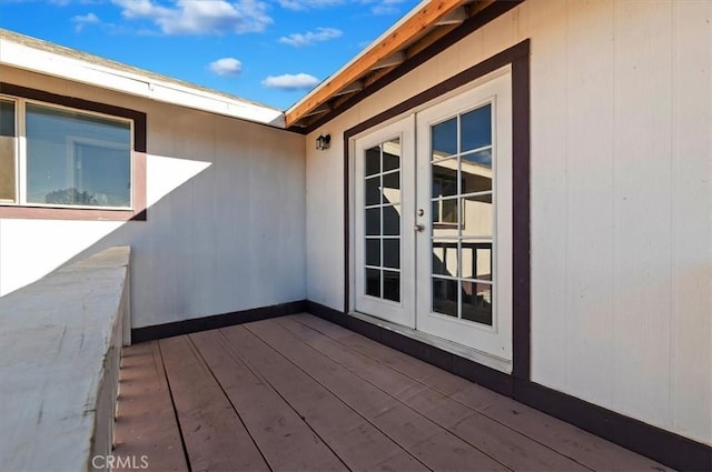 wooden deck featuring french doors