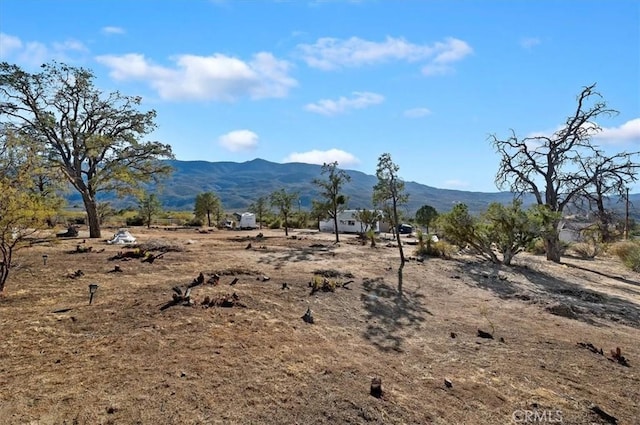 mountain view featuring a rural view